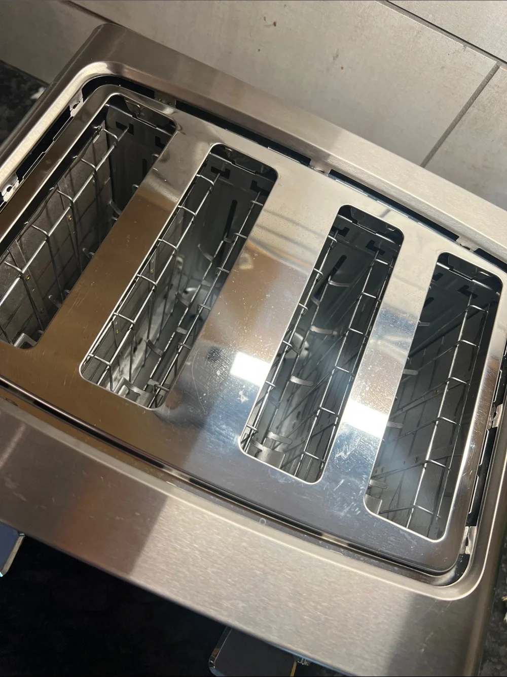 Wide 4 Slot Black and Decker Stainless toaster. Like new.